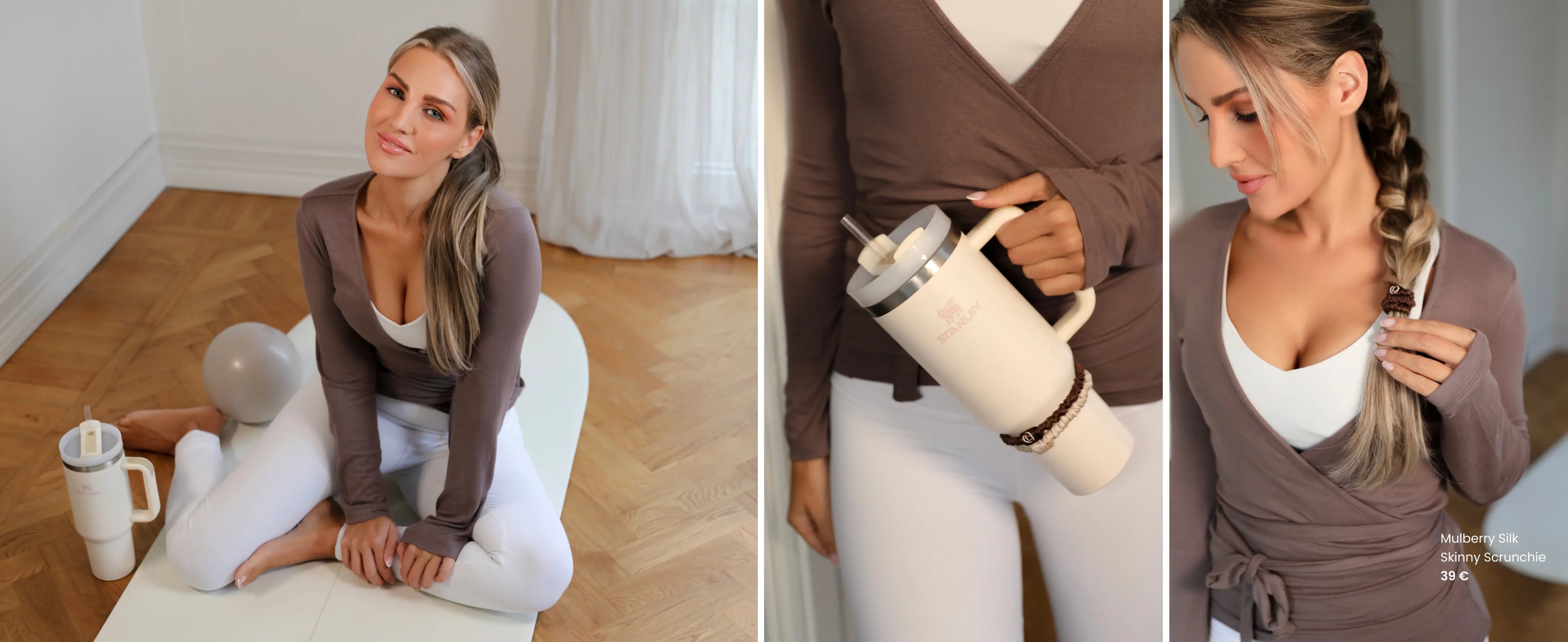 Kvinna i träningskläder med Lenoites Mulberry Silk Skinny Scrunchie i håret och runt handleden, sittande på yogamatta och hållande en vit Stanley-mugg.