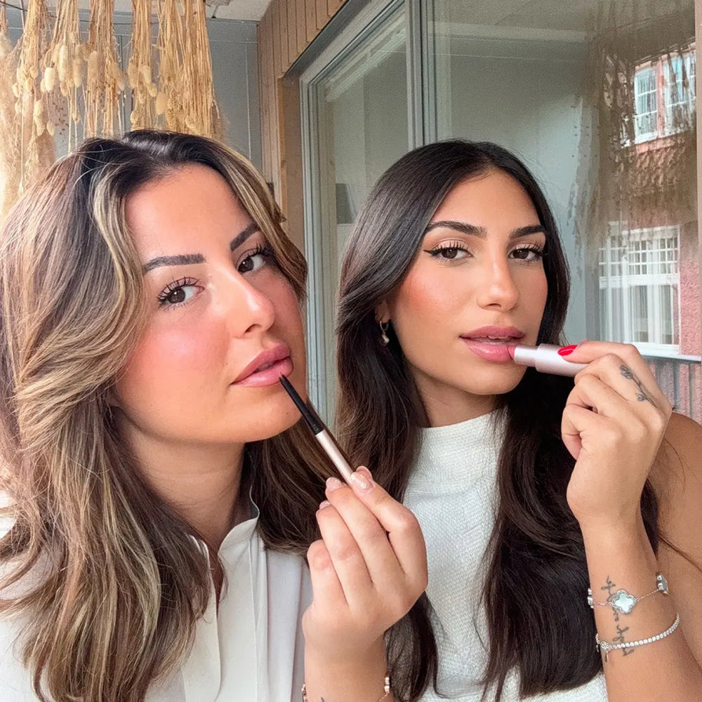 Sculpt and Hydrate Lip Duo by Lenoites featuring a Tinted Lip Balm in color bloom, a Shape & Sculpt Lip Liner in color blush, elegantly arranged on a light beige background.